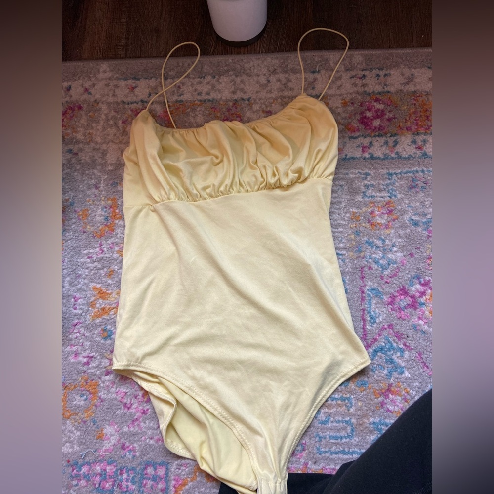 Yellow bodysuit